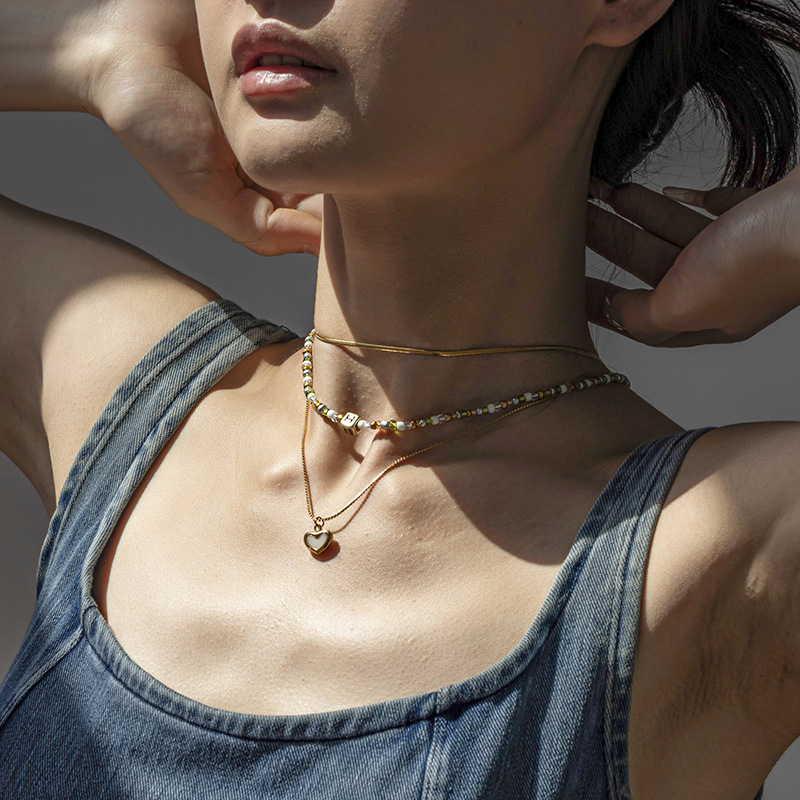 TENA Europa y los Estados Unidos original nicho de diseño amor conchas de arroz cuentas puro collar de acero inoxidable conjunto de collares