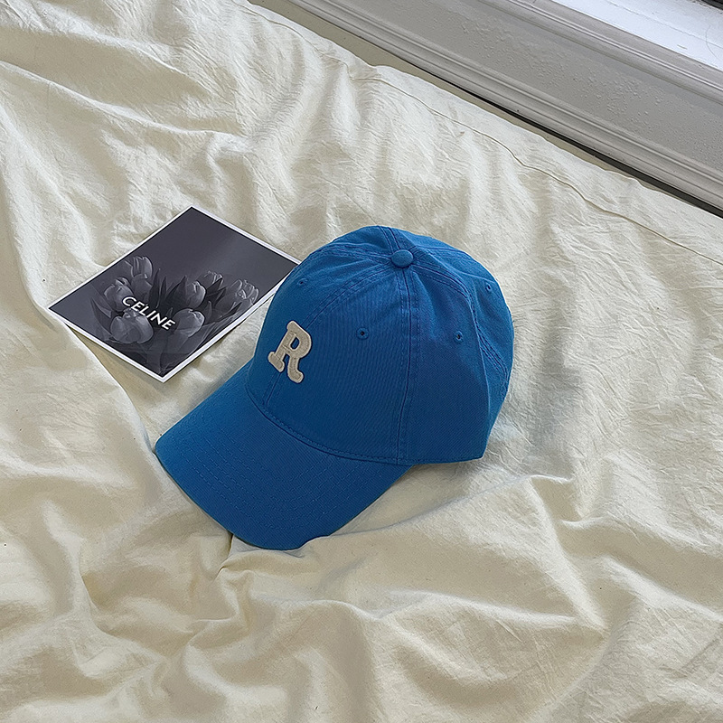 Gorra de béisbol estilo coreano circunferencia de la cabeza grande cara-mirando pequeño sombrero hombres y mujeres pareja moda todo partido letra R gorra al por mayor