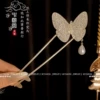 Two tooth-flash diamond butterfly