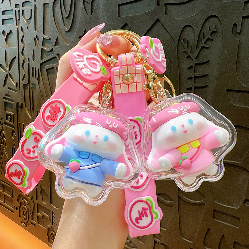 Caricaturas lindas estrellas de fresa conejo creativo llavero de automóvil bolsas colgantes pareja año del conejo pequeño regalo al por mayor