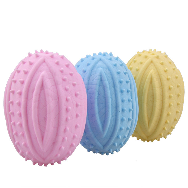 Amazon nuevo TPR espuma leche sabor púas sólido rugby mascota juguete mordedura juguete molar