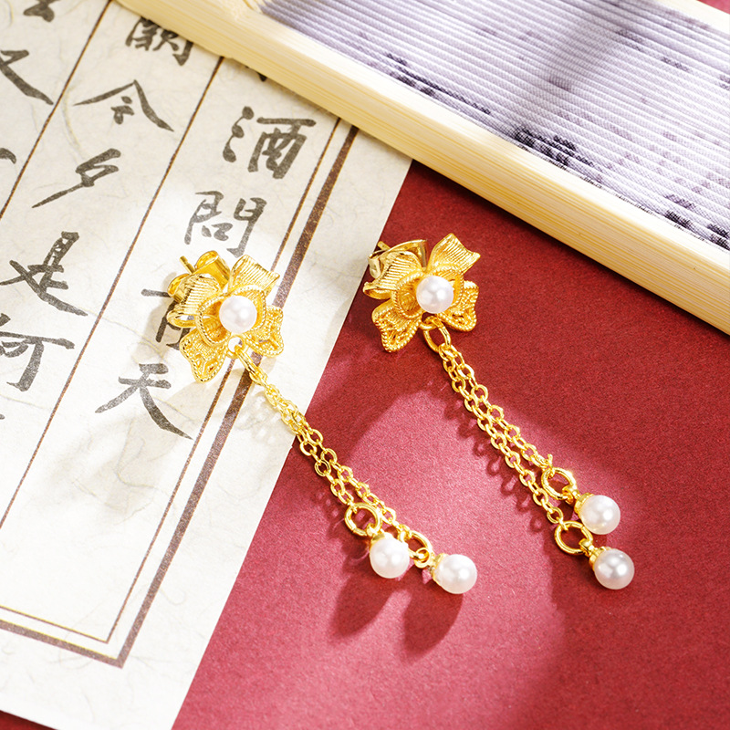 Nuevos pendientes de oro de arena vietnamita de estilo étnico, pendientes de borla de perlas de imitación de lazo, joyería de alta gama de lujo ligero femenino