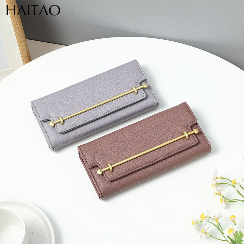 Cartera de mujer, estilo largo, lujo ligero, monedero de nicho, color sólido de alta gama, bolso de mano con tapa abatible creativa, venta al por mayor.