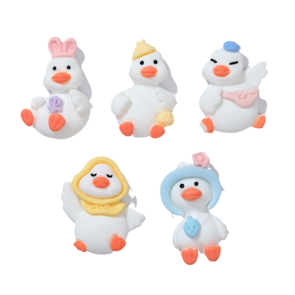 Sombrero de paja al por mayor de pato de celebridad de Internet de dibujos animados de cabeza torcida DIY accesorios de resina teléfono móvil Shell accesorios para el cabello agujero hebilla de zapato