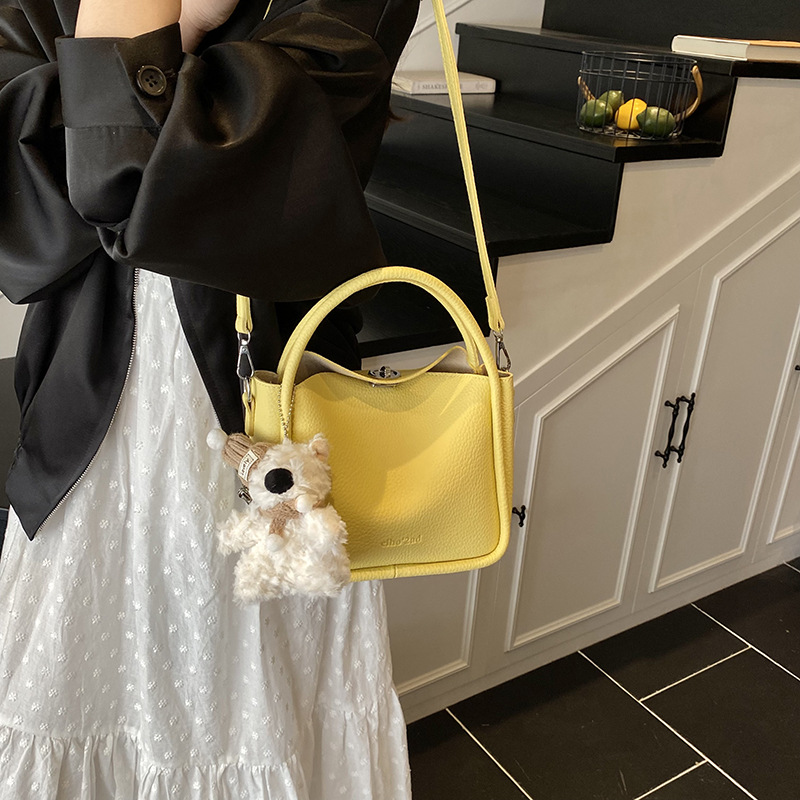 Bolso de cesta de verduras de estilo caliente de comercio exterior para mujer 2025 nuevo bolso de hombro casual simple bolso de cubo de aire occidental salvaje