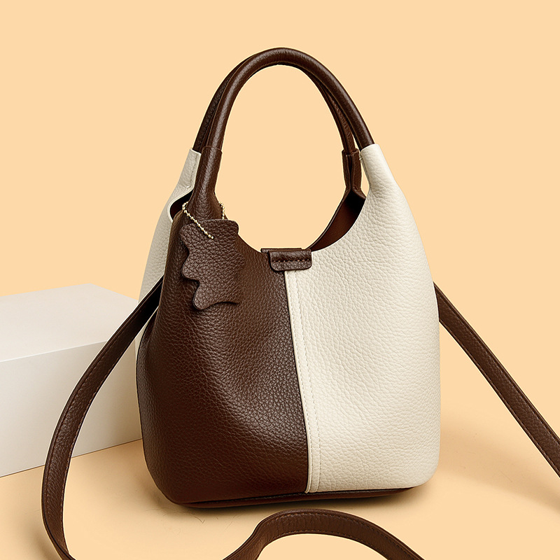 包包女2025新款真皮通勤手提包时尚变形单肩子母小众质感水桶包