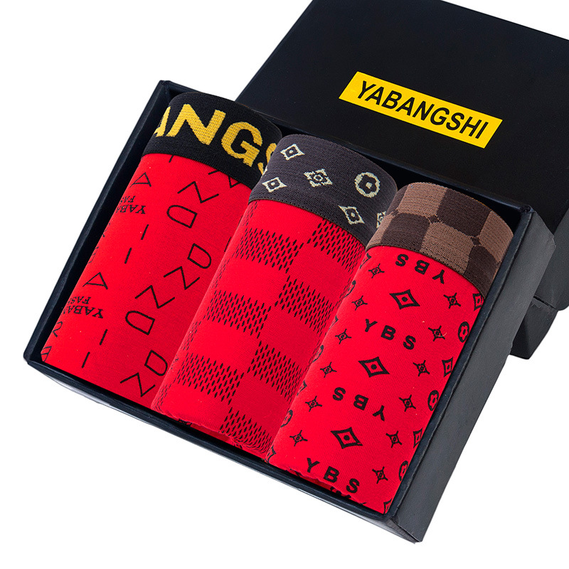 Ropa interior de los hombres boxeadores de los hombres impresos brillante rojo primavera Festival ceremonia de boda boxeadores Mediados de cintura cabeza en caja