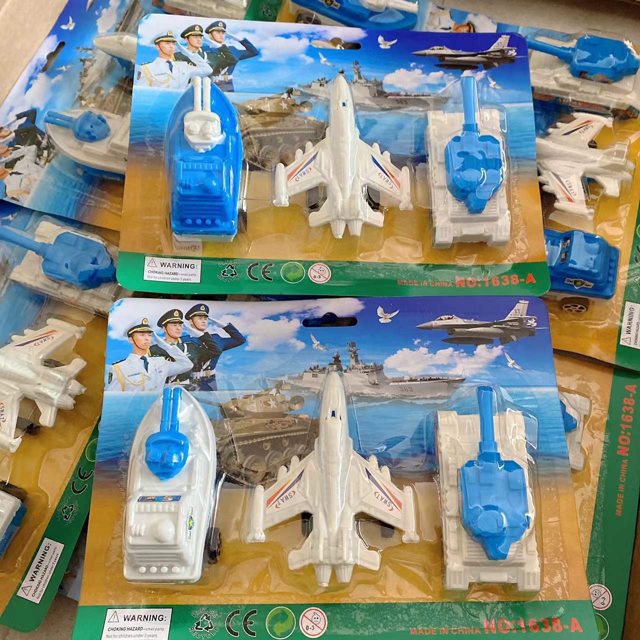 Juguetes para niños playa Tarjeta de succión juguete pistola juego casa juguete pintura juguetes 2 yuanes grandes almacenes al por mayor