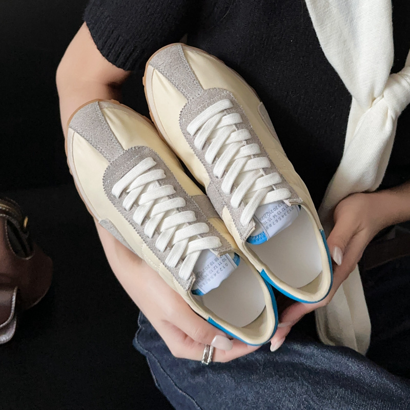 Direct from the factory! These German training shoes are so comfortable you won't want to take them off. Soft-soled, casual white sneakers with a vintage, distressed look for women