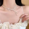 Жемчужное ожерелье с односторонним бантом