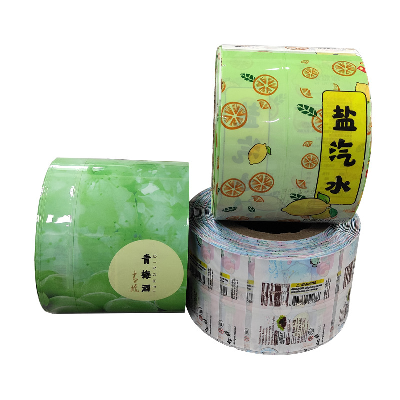 Película de etiqueta de impresión Película Termocontraíble Impresión en color Botella de vino de bebidas Película de etiqueta Proteína en polvo Embalaje de plástico Película de sellado Rollo de película