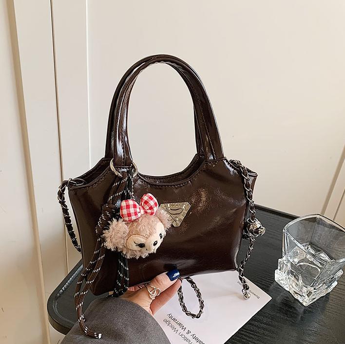 Bolso de mano explosivo transfronterizo para mujeres 2025 primavera nueva cadena de bolso de hombro universal de alta calidad bolso de cubo de agua