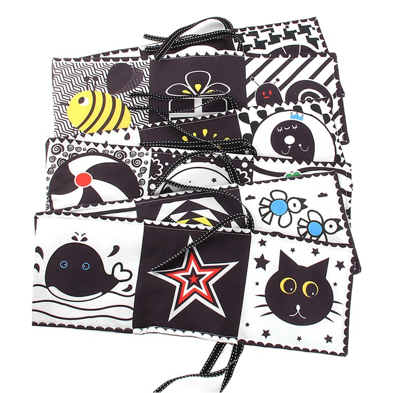 Libro de tela de cama blanco y negro de doble cara transfronteriza de 12 páginas puede morder y desgarrar libro de tela para bebés juguetes de educación temprana