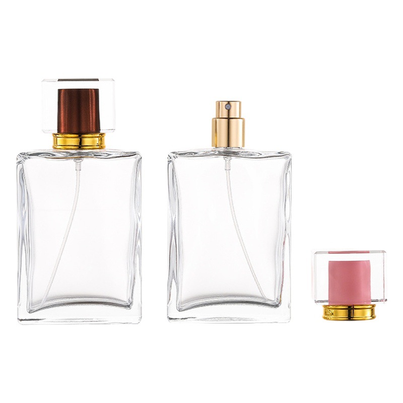 En stock cubierta de acrílico B015-50ML100ml cuadrado transparente vidrio perfume spray sub-embalaje cosmético botella vacía