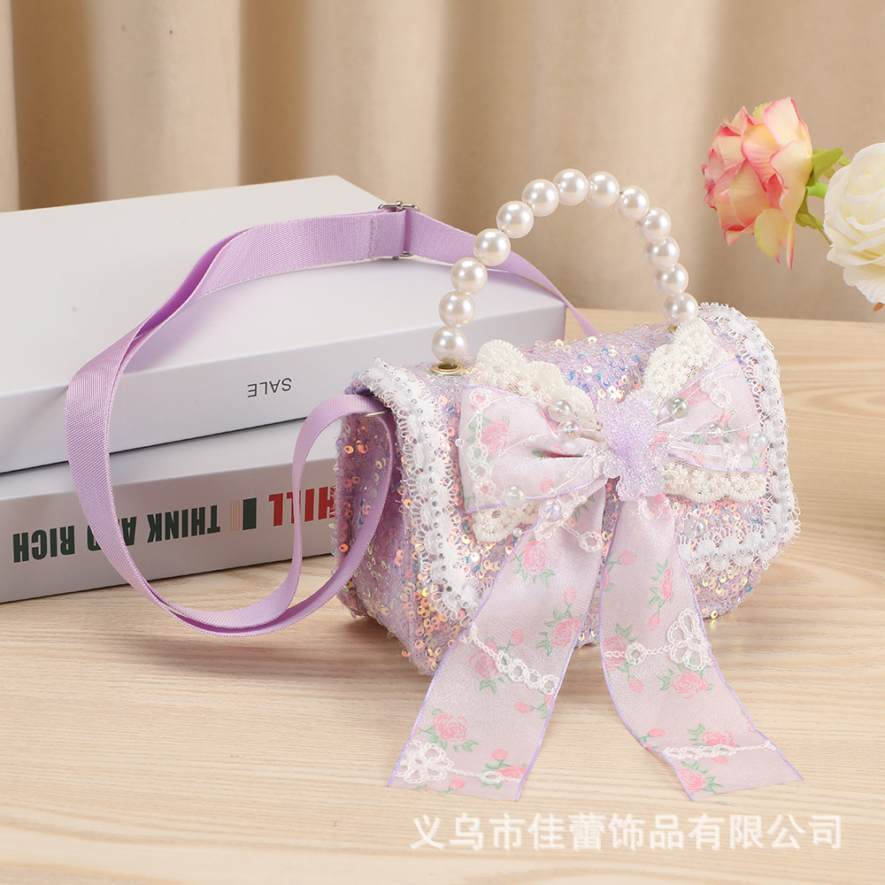 Bolsos para niñas, modernos bolsos cruzados estilo Chanel para niñas pequeñas, elegantes bolsos con lazo de perlas para niñas pequeñas, impermeables.