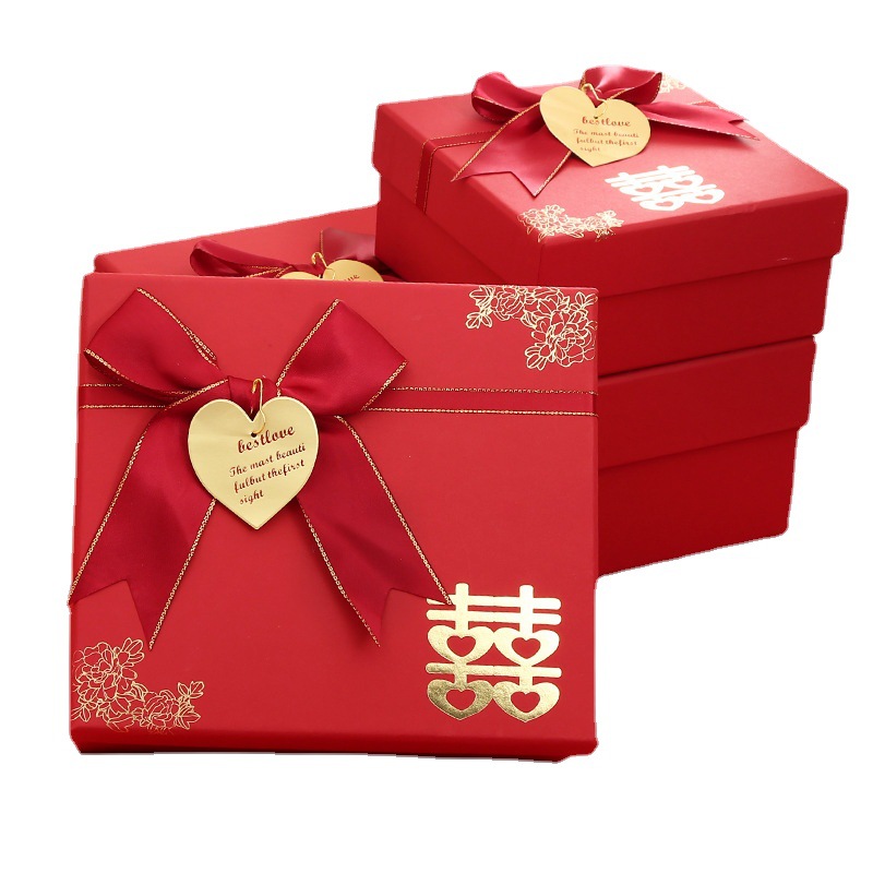 Spot rojo arco caja de dulces de boda compañero de boda caja de regalo de mano cubierta de cielo y tierra caja festiva caja de regalo exquisita al por mayor