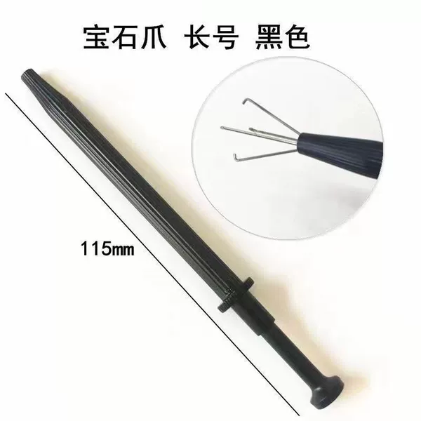 Long, black, with gem