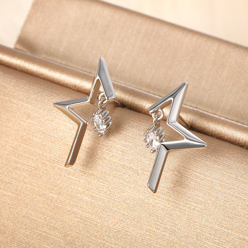 Xuping joyería de aleación estereoscópica estrella simple pendientes de orejas personalidad femenina alta sensación de moda auriculares al por mayor