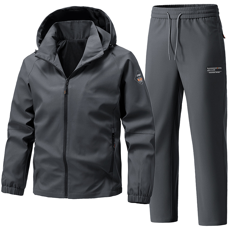 Trajes deportivos transfronterizos para hombres 2026 primavera y otoño sombrero desmontable chaqueta de asalto para hombres pantalones rectos de trabajo de dos piezas