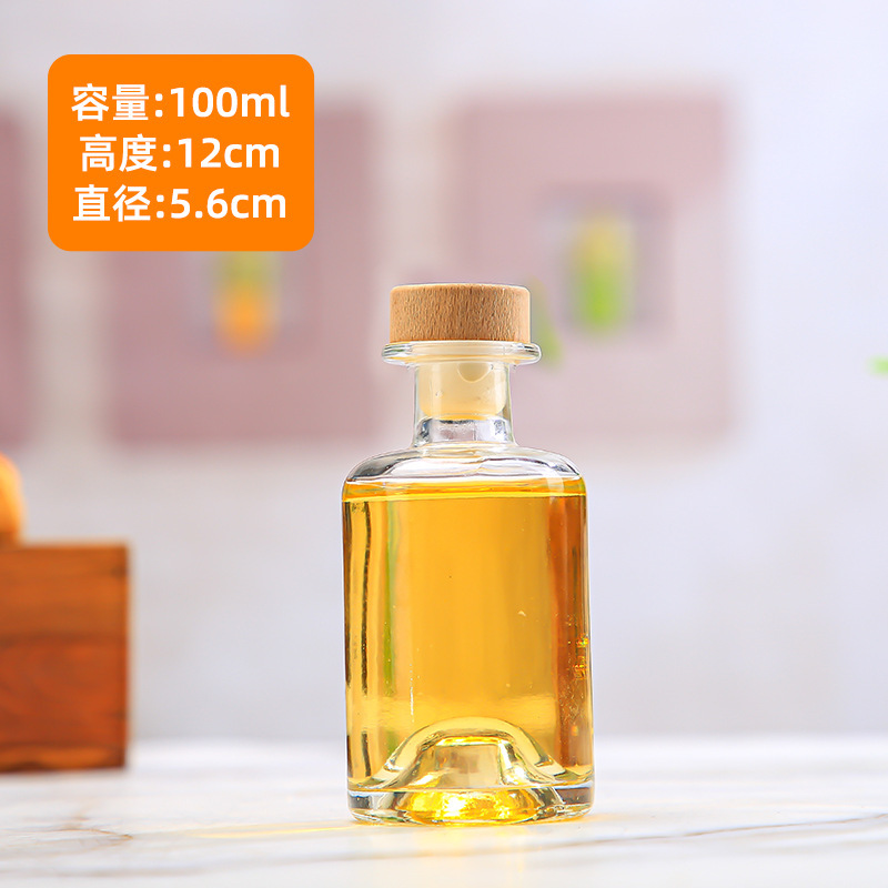 Botella de vodka al por mayor Botella de vino de fondo cóncavo Botella de vino extranjero Botella de vino amarillo de gran capacidad Botella de vino de ciruela transparente Botella de vino de frutas de vidrio