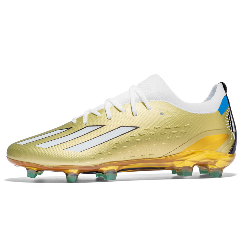 Nuevos juveniles transfronterizos de clavos largos de clavos deportivos de baja altura de la Copa del Mundo TF zapatos de fútbol entrenamiento al por mayor