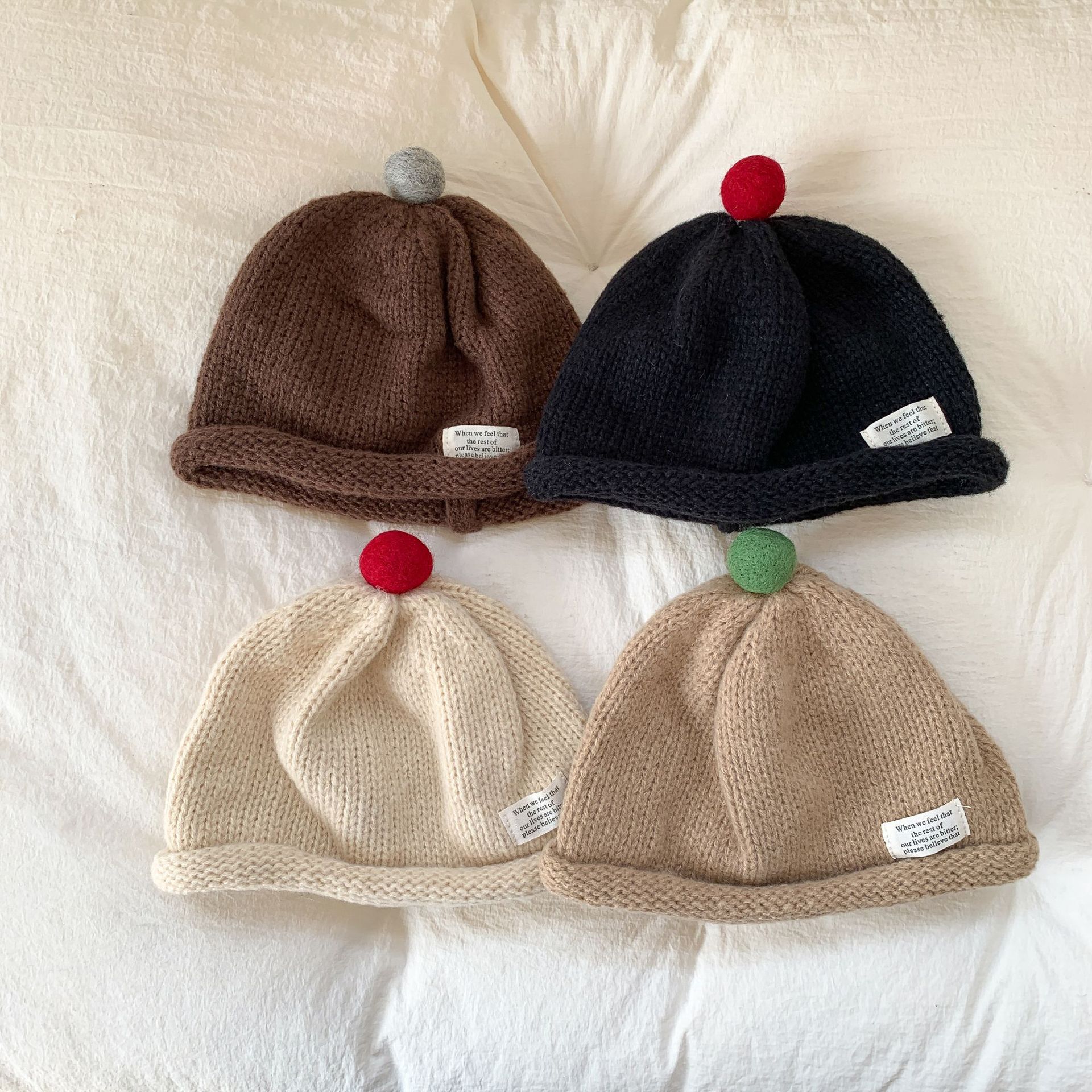 Sombreros de Año Nuevo para niños otoño y invierno niñas sombreros de lana sombreros de punto 2024 nuevos bebés de invierno sombreros de oído calientes