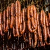 5 pounds of spicy sausage [overflowing with spicy aroma] (-)