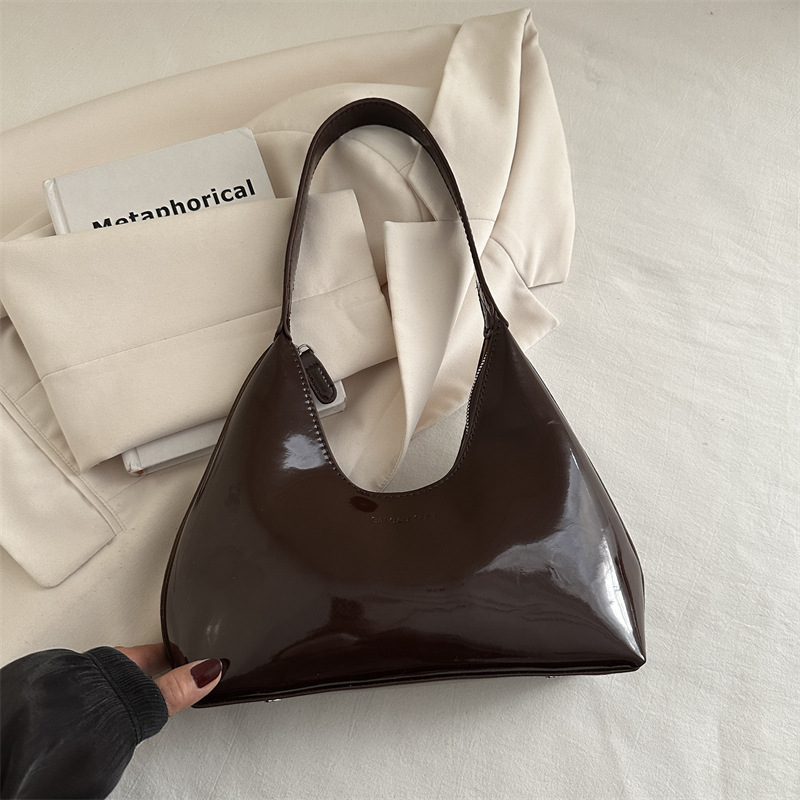 Moda casual axila media luna bolso de mujer charol bolso de hombro portátil estilo caliente Europa y América retro brillante sensación de alta gama