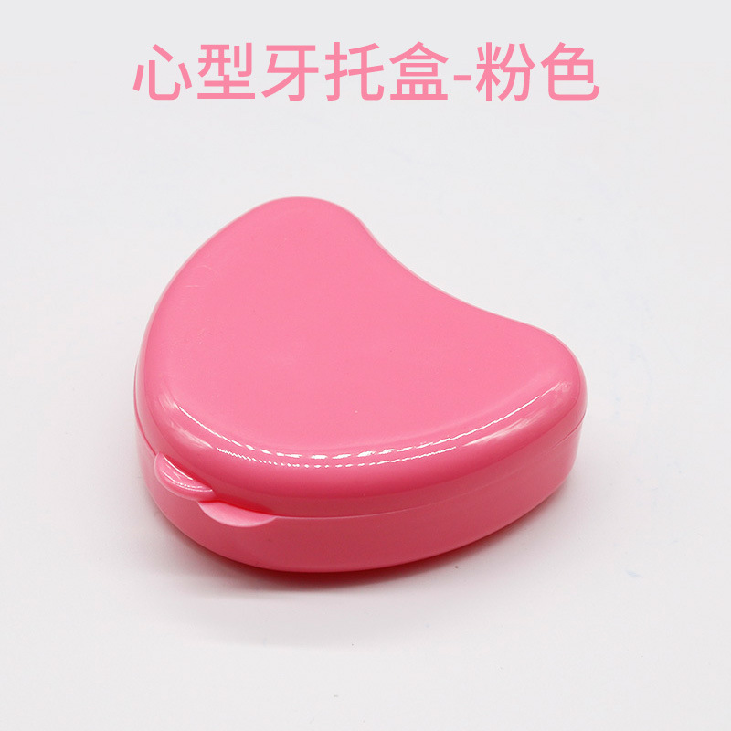 Caja de soporte de diente de plástico colorido caja de soporte de dentadura en forma de corazón caja de soporte de caja de diente pequeño lindo caja de almacenamiento de diente en forma de corazón al por mayor