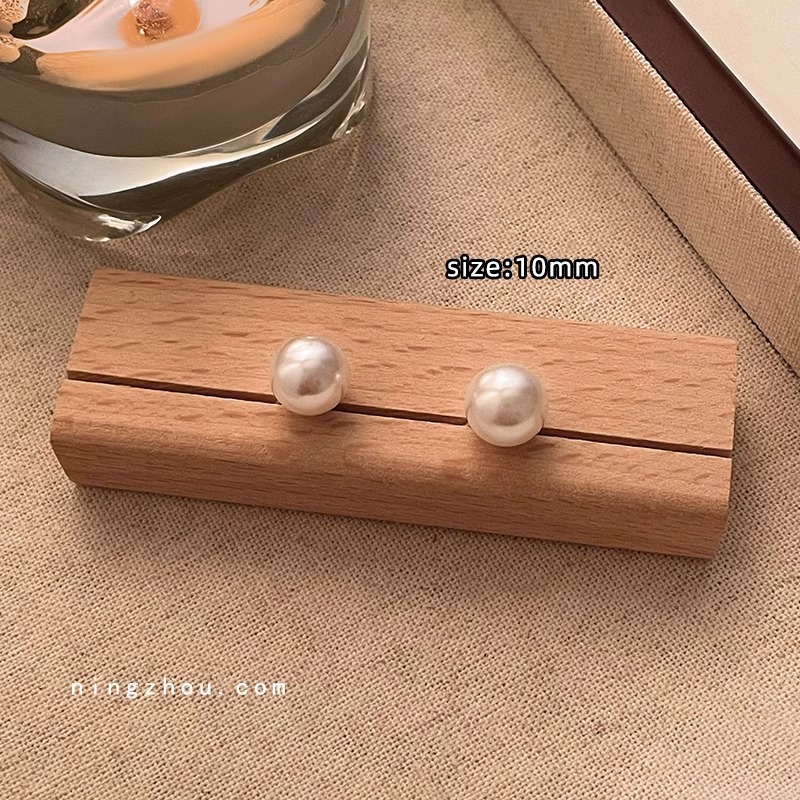 Pendientes de perlas, pendientes de estilo caliente, lujo ligero, pendientes simples de celebridades de Internet, accesorios de Yiwu, venta al por mayor