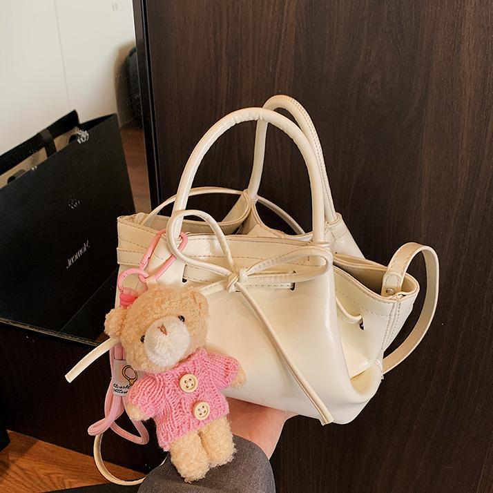 Nicho de diseño coreano bolsas de canasta de verduras para mujeres 2025 nueva moda bolsas de cubo de alta calidad bolsas de hombro