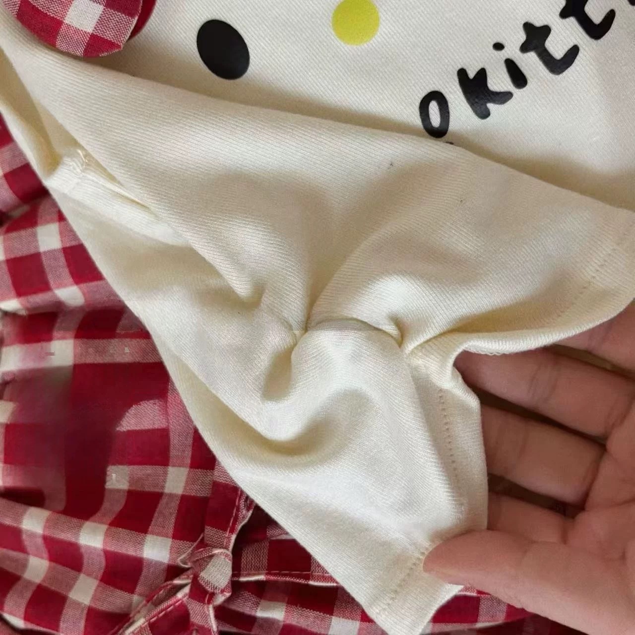 女の子の夏のスーツ2025の新型の洋気の子供のかわいい漫画のプリントの半袖のtシャツの格子のつぼみのスカート