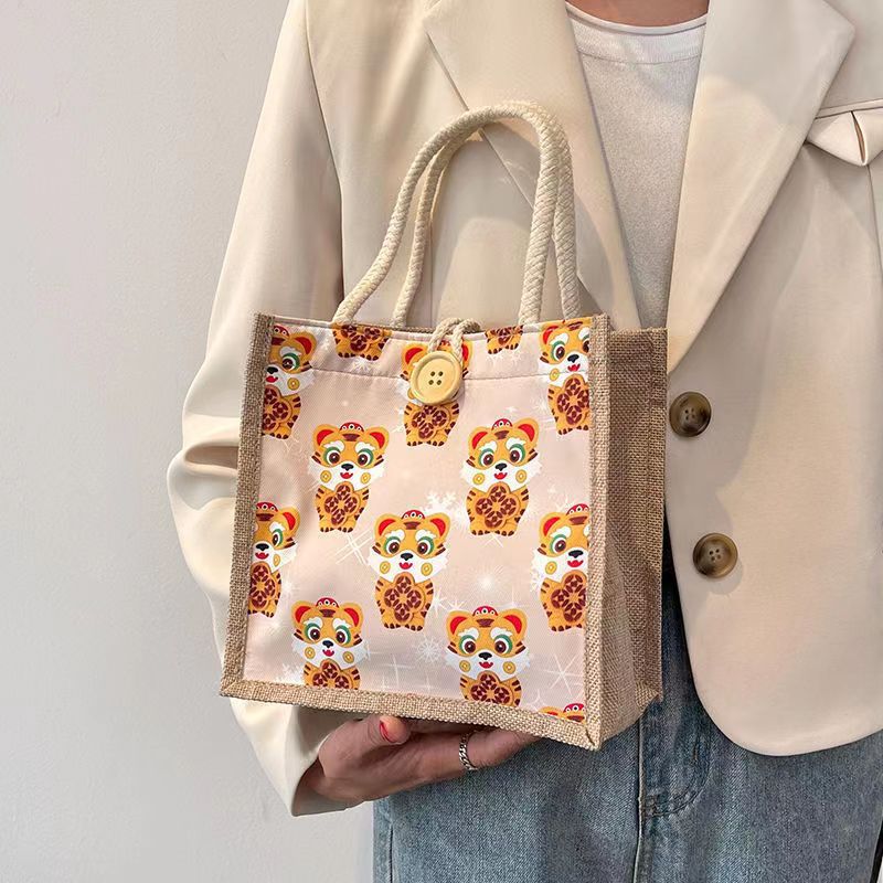 Algodón y lino Bento bolso bolsa para las mujeres 2022 Nuevo Tigre año de estilo occidental caja de almuerzo bolsa ins gran capacidad pequeña bolsa de hombro