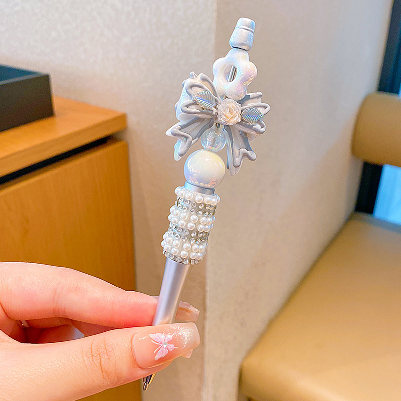 Bolígrafo negro muñeca dibujos animados DIY bolígrafo creativo diamante Snowflake princesa Elsa papelería infantil de color