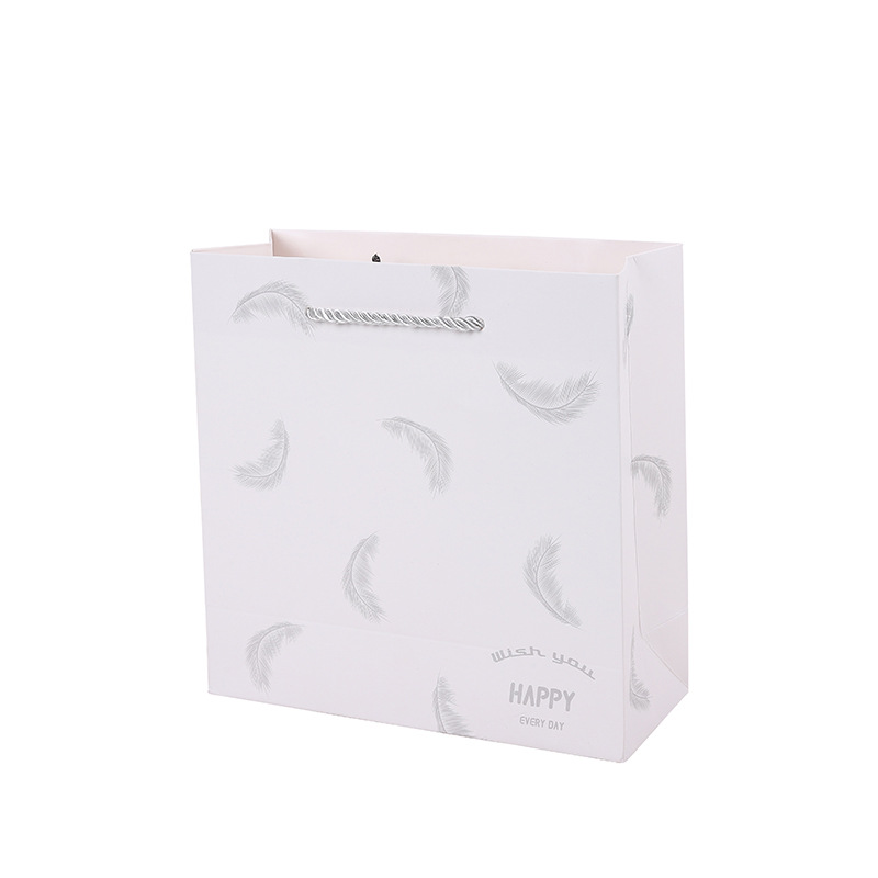 现货 ins白色羽毛礼品袋护肤品方形手拎袋子服装广告手提纸袋