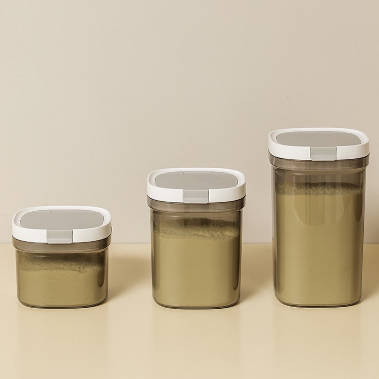 Frasco sellado de grado alimenticio de plástico tarro de leche en polvo arroz en polvo caja de almacenamiento tarro caja de almacenamiento de silicona magnética colgante cuchara sellada tarro