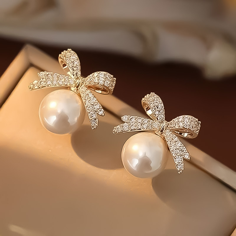 Retro summer small design earrings with zircon with bow from pearl