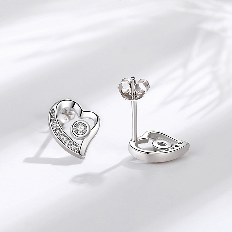 Pendientes de plata esterlina S925 pendientes encantadores de plata de aguja de plata 925 al por mayor pendientes de estilo europeo y americano en forma de corazón incrustados en diamantes para mujeres