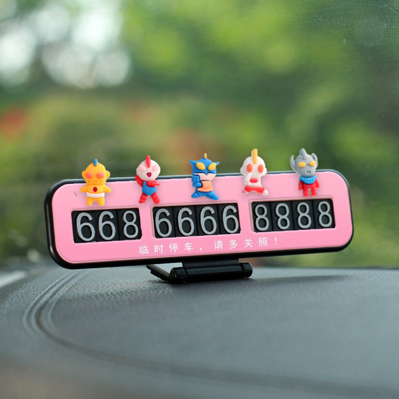 El nuevo adorno de coche de muñeco pequeño súper lindo adorno de pantalla de navegación de consola central de coche de dibujos animados adorno de cabeza