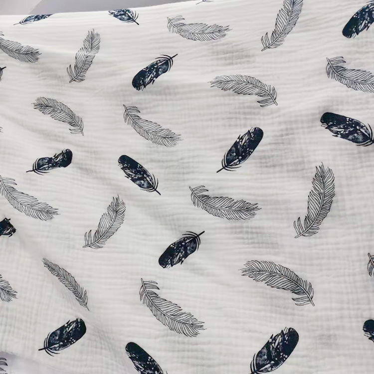 Proveedores de China blanqueado orgánico de doble capa de gaza algodón tulle bebés manta tela
