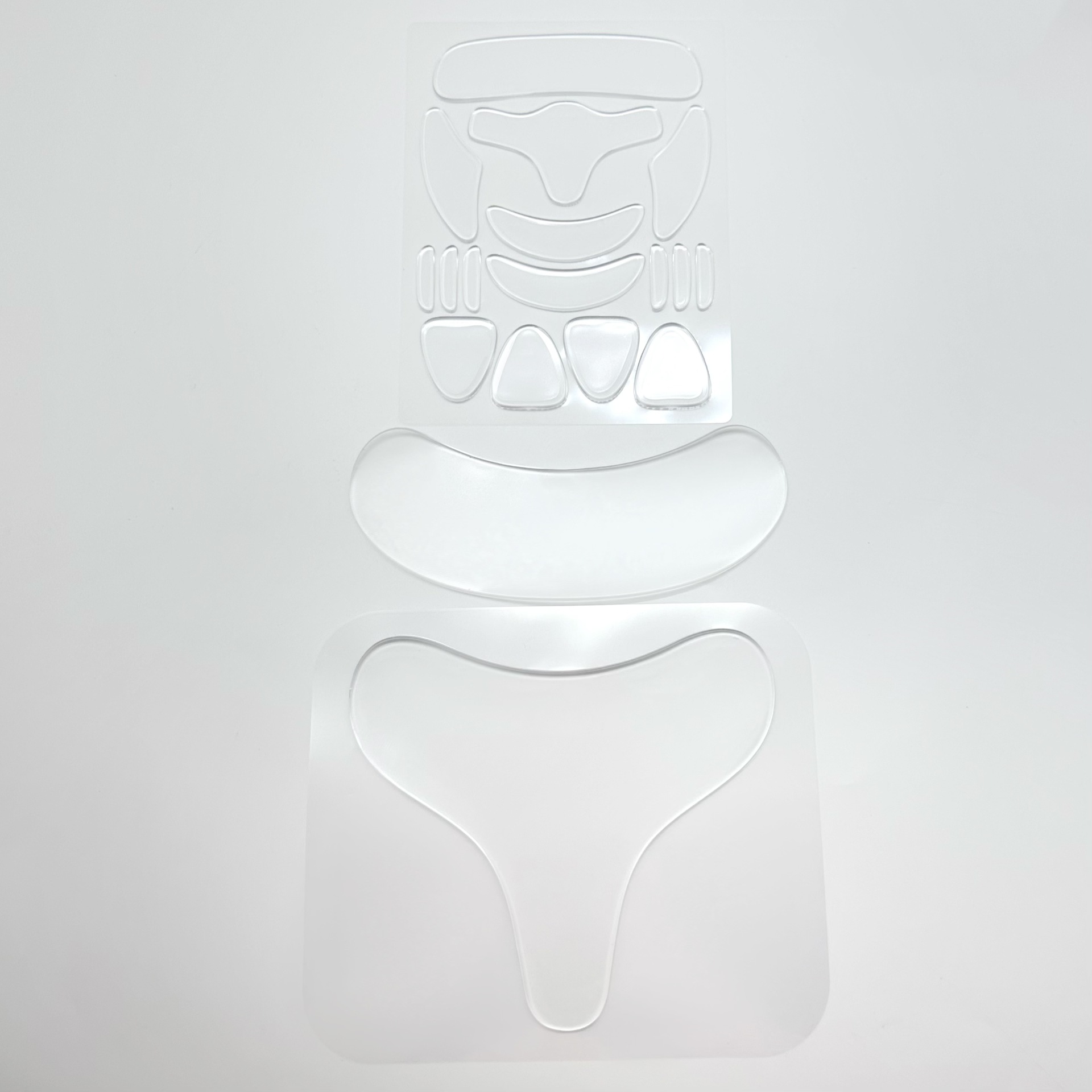 Pegatinas de frente antiarrugas de silicona de fábrica Pegatinas de cara de 11 piezas con embalaje de caja de color Pegatinas de cuello Pegatinas de barbilla Levantamiento y apriete