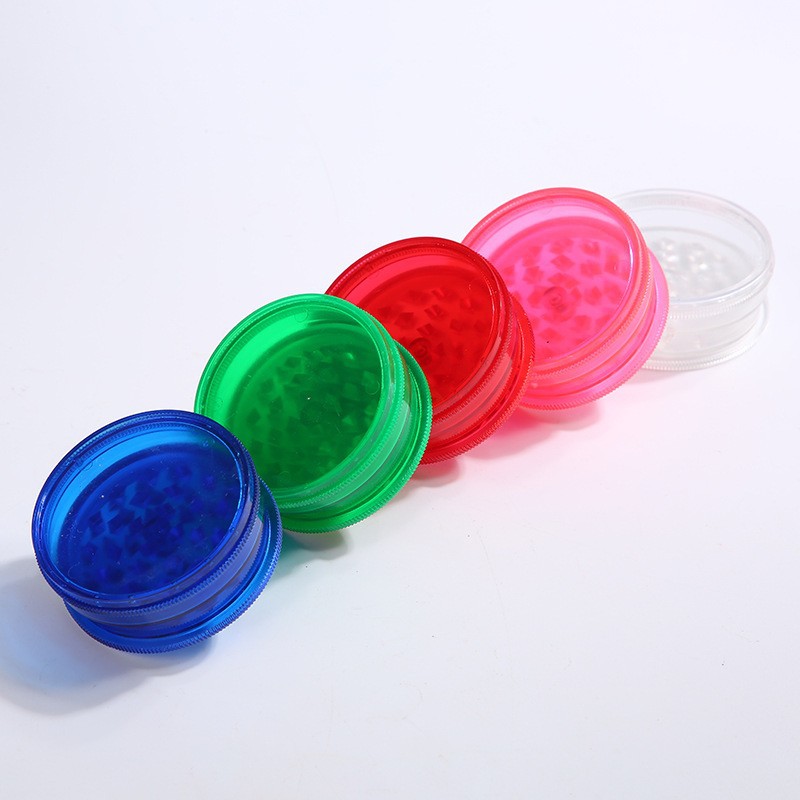 Fábrica directa de cigarrillos transfronterizos venta caliente molino de humo de plástico de tres capas 60mm molino manual triturador de humo