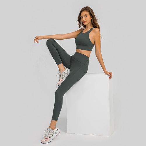 One piece drop shipping new upgraded nude yoga pants high waist abdominal side pocket sports running fitness nine-point pants