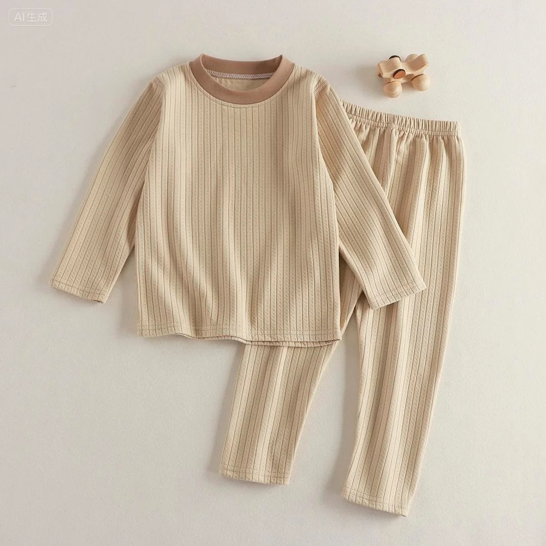 Jacquard de algodón de cuello redondo de dibujos animados set de ropa para el hogar de niños 2025 otoño y invierno nuevo Derong abrigo tejido de otoño pantalones de otoño