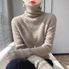 超保温ニットの秋冬の新型の中に快適な高襟のセーターを掛けます。