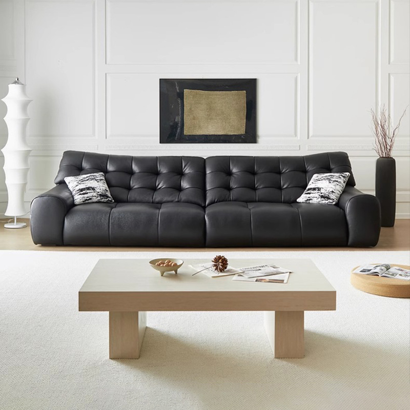 Gran sofá de oso negro capa superior piel de vaca apartamento pequeño sala de estar estilo italiano minimalista estilo antiguo sofá de cuero con respaldo alto negro