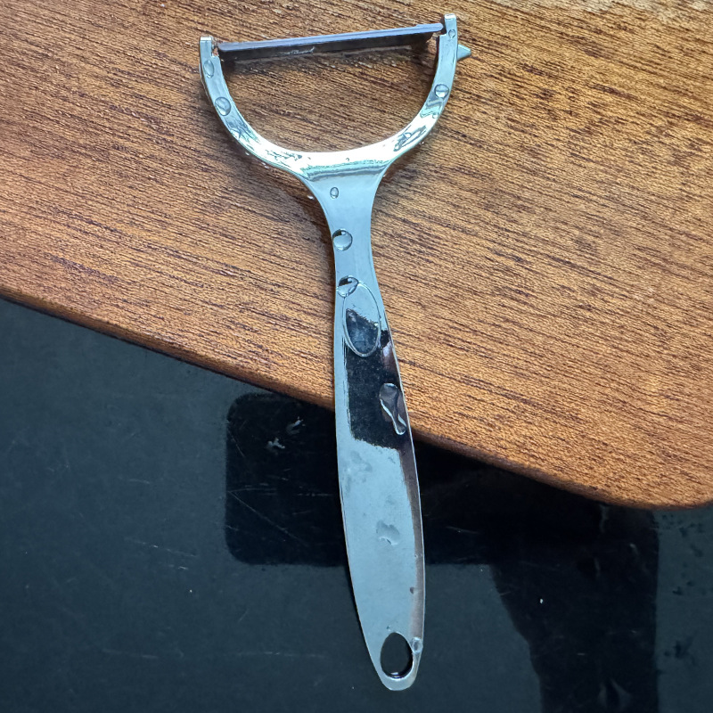 Acero inoxidable pelador hogar Wuhe fruta patata melón cocina tres en uno aleación de zinc pelador rallador