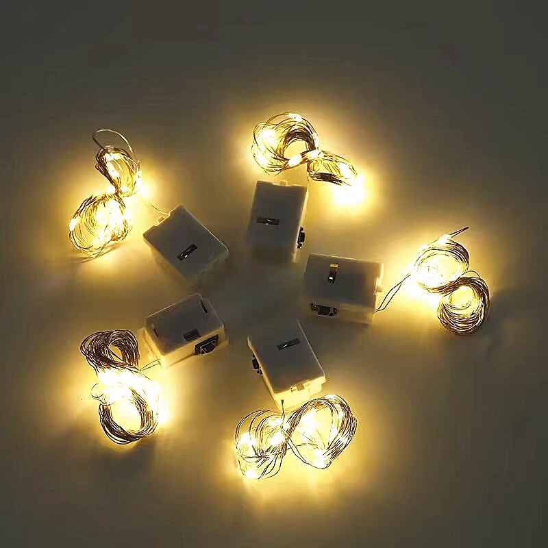 LED botón batería pequeña caja blanca flores de colores luces de cadena al por mayor árbol de Navidad decoración de alambre de cobre atmósfera luces de cadena