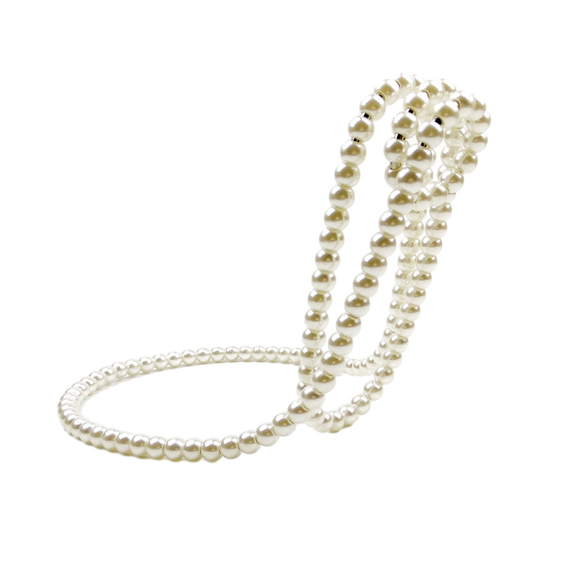 Venta caliente transfronteriza casa personalizada collar de perlas suspensión estante del vino decoraciones de escritorio creativo adornos de estilo ligero de lujo