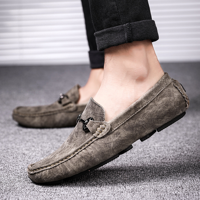 Transmisión en vivo de primavera y otoño, zapatos de cuero para hombres, nuevos zapatos casuales de veludo anti-paseoso, zapatos de hombre con un solo pie.